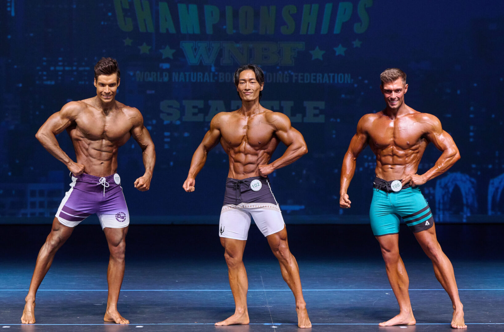 https://worldnaturalbb.com/wp-content/uploads/2023/12/2023-WNBF-Pro-Worlds-Mens-Physique-Overall-Seattle-scaled.jpg